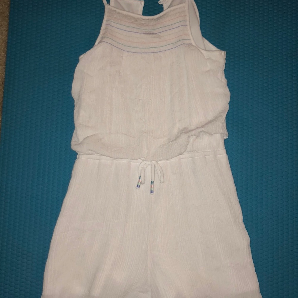 White with pastel colors romper